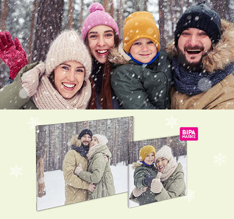 Fröhliche Familie im Schnee mit Fotoleinwänden – unvergessliche Wintermomente als Wandbilder im BIPA Fotoshop.