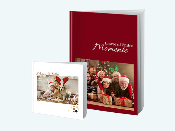Zwei weihnachtlich gestaltete Fotobücher von BIPA Fotoshop mit persönlichen Bildern – perfekt als Geschenkidee zu Weihnachten.